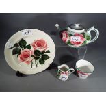 Wemyss Ware - A Wemyss teapot, sucrier and creamer, decorated in the Cabbage Rose pattern,