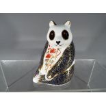 Royal Crown Derby - a paperweight depicting a Panda, approx 10 cm (high) Condition - no chips,