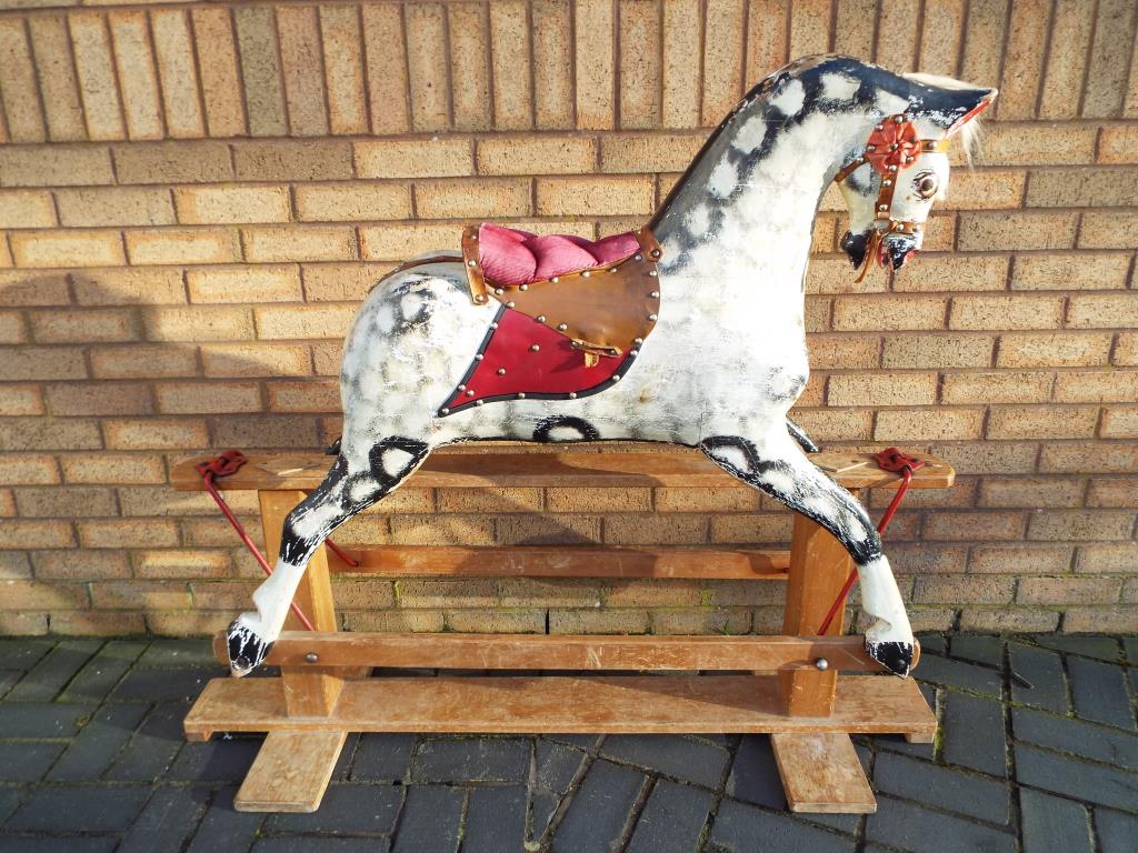 Collinson - a vintage Collinson piebald rocking horse on gliders,