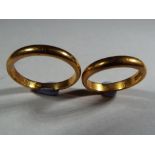 22 ct - two hallmarked 22 carat gold wedding bands, approximate size K and N, approximate weight 8.