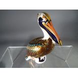 Royal Crown Derby - a paperweight depicting a Brown Pelican,
