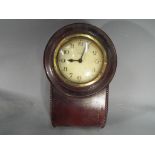 A small German mahogany cased wall clock with 8 day movement.