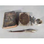 A collection of silver hallmarked items to include an Edward VII prayer book with silver front