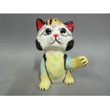 Lorna Bailey - a figurine depicting a cat with butterfly to the head, signed,
