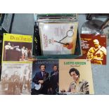 A quantity of 33 RPM vinyl records to include Bluegrass, The Dubliners, Pete Seeger,