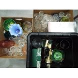 A mixed lot of glassware to include drinking glasses, vases, dishes and similar.