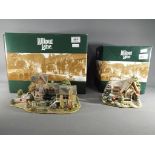A pair of British Heritage Lilliput Lane ornaments to include Christmas Lights L2485 and a Full