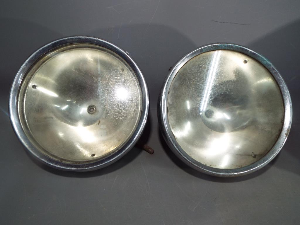 Rotax - A pair of vintage Rotax K596 chrome plated headlamps, 27 cm (d).