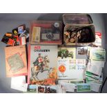 A mixed lot to include stamps, coins, matchbooks,
