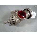 A Lucas motor cycle rear light No 344 (acetylene) first produced in 1915 and discontinued in 1929 -