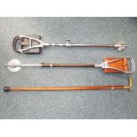 Two adjustable shooting sticks including one by Gamebird and a brass handled walking stick.
