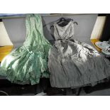 Two full length evening evening dresses, measuring approximately 128 cm length,