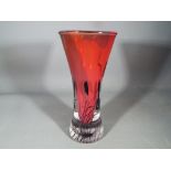 John Ditchfield for Glasform - A red tinted tapered vase and trail decoration,