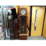 An oak cased Enfield long case clock, Arabic numerals, with weights and pendulum,