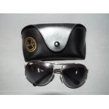 A pair of Ray Ban sunglasses, etched 'RB' to left lens, marked to the bridge '6415',