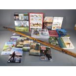 Angling - a 3 - piece cane fishing rod with cork handle and a quantity of DVDs and angling related