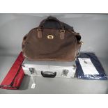 Fiore - a good quality Fiore travel bag with padlock and key, a flight case,