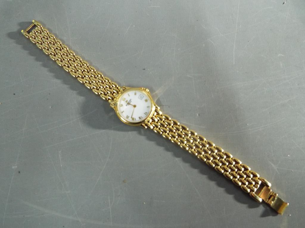 Raymond Weil - A lady's Raymond Weil wristwatch, Roman numerals to a white dial, date aperture at 3, - Image 4 of 4