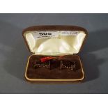 A pair of gentleman's 9ct gold hallmarked cufflinks contained in original presentation case,