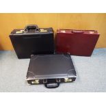 Three briefcases to include one by 'Hunter'.