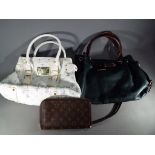 Handbags - a good quality leather green and brown handbag and two further handbags marked with