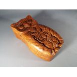 Wooden puzzle box in the shape of an owl, measuring approximately 5 cm [h] x 15 cm [L] x 8 cm [w].