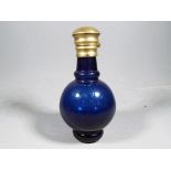 Bristol Blue perfume glass bottle measuring approximately 8 cm tall.