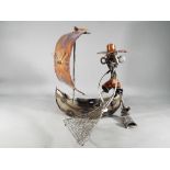 An unusual metal hand made novelty clock in a form of a Fisherman,