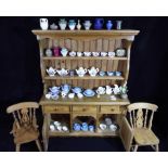 A small model of a pine dresser, approximately 70 cm x 46 cm x 17 cm,