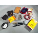 A good mixed lot to include a Zippo lighter 2032695,