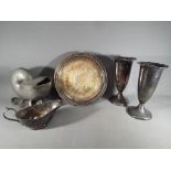 A collection of plated ware to include a salver / card tray,