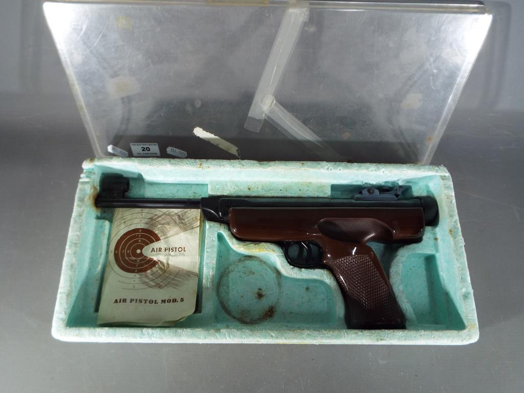 An 'Original' Model 5 .22 cal break action target air pistol contained in original box.