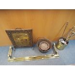 A quantity of metalware to include fire screen, fireside items, candlesticks,