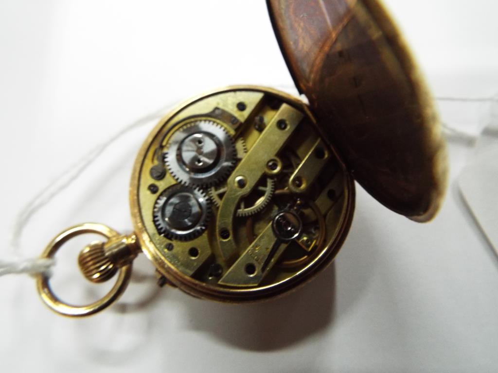 A lady's 14ct gold pocket watch, Roman numerals to the dial, case stamped 14 K, - Image 3 of 3