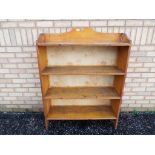 A wooden storage book shelf approximate height 126 cm x 95 cm x 34 cm