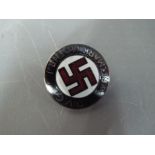 A pin badge with German decoration