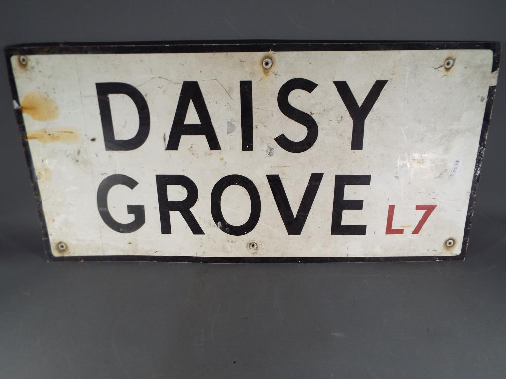 A metal Daisy Grove Liverpool metal street sign, measuring approximately 71 cm x 35 cm.