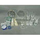 A mixed lot of glassware to include drinking glasses, bowls, vases,