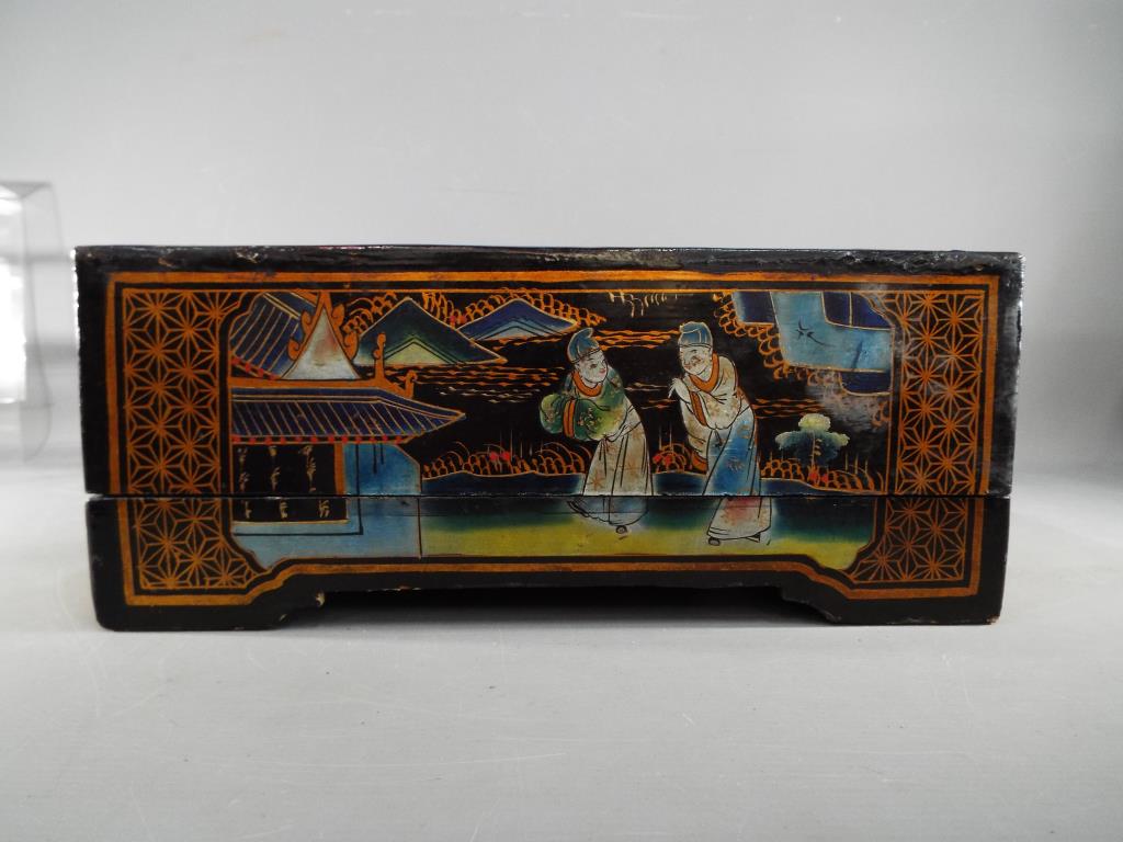 A mid 20th century - A large lacquered box and detachable cover having hand painted figure scene - Image 2 of 13