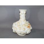 A rare and unusual Chinese dehua porcelain (Blanc de Chine) bottle vase with applied pine tree and