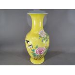 A large 19th century, Chinese famille rose sgraffito vase with everted rim,