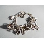 A silver charm bracelet with 15 charms