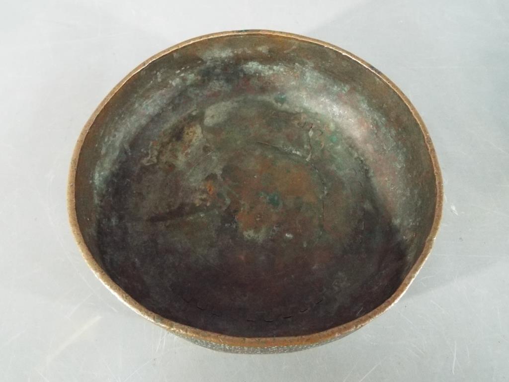 A Persian 14th century Timurid, tinned copper bowl of deep rounded form with slightly everted rim, - Image 3 of 6