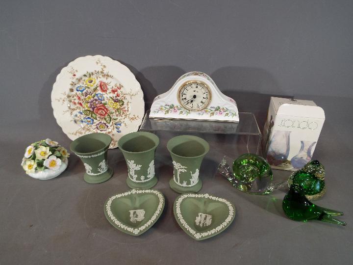 A mixed lot to include Wedgwood Jasperware, paperweights, Aynsley ceramic clock case and similar.