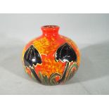 Anita Harris - a vase decorated with images of toadstools