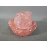 A 19th century, Chinese rose quartz incense burner and cover on wooden stand,