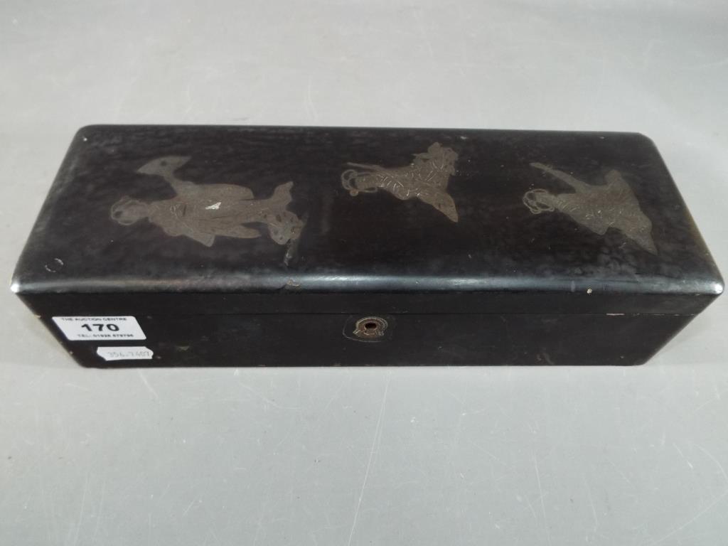 A 19th century black lacquered box containing 38 jade stones. - Image 2 of 5