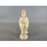 A very rare 18th century Chinese jade or hardstone carving of Guanyin holding a Ruyi sceptre or