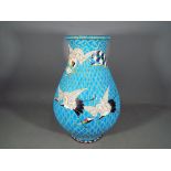 A baluster form, enamelled earthenware vase by Matsuura,