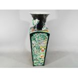 A rare Chinese famille noir Kangxi vase with everted rim,